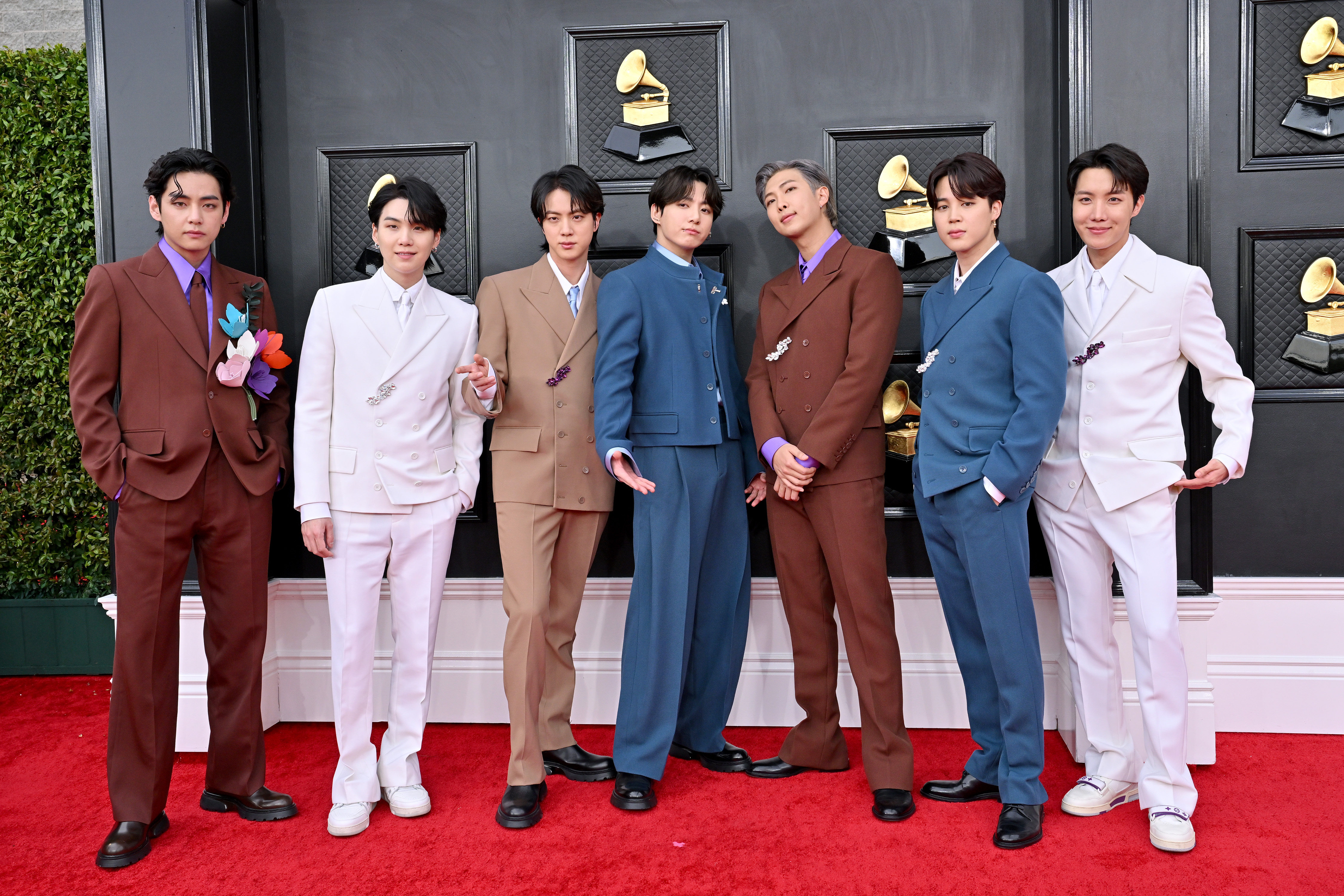 1389467249 LAS VEGAS, NEVADA - APRIL 03: (L-R) V, Suga, Jin, Jungkook, RM, Jimin and J-Hope of BTS attends the 64th Annual GRAMMY Awards at MGM Grand Garden Arena on April 03, 2022 in Las Vegas, Nevada. (Photo by Axelle/Bauer-Griffin/FilmMagic)