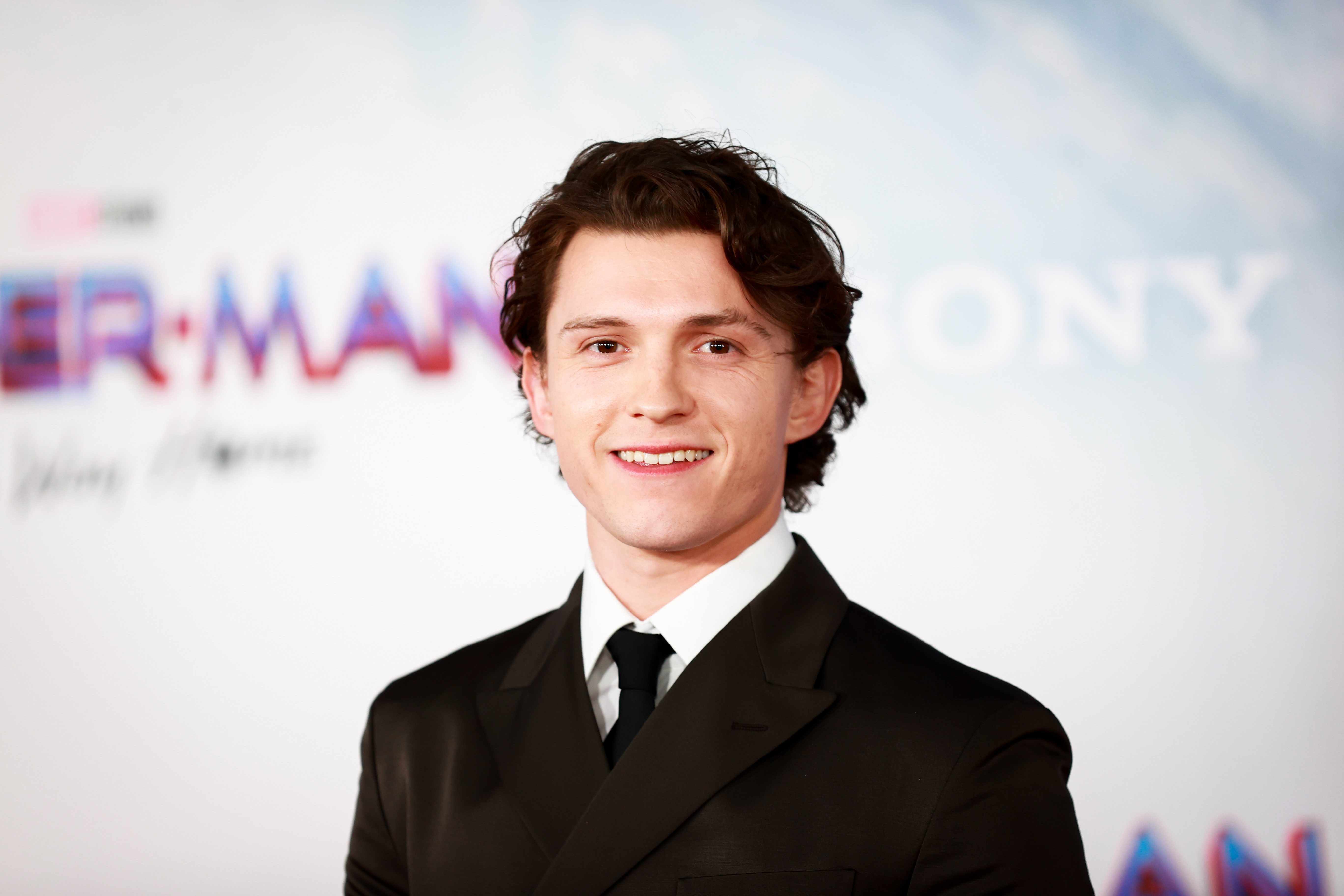 1358904475 LOS ANGELES, CALIFORNIA - DECEMBER 13: Tom Holland attends the Los Angeles premiere of Sony Pictures' "Spider-Man: No Way Home" on December 13, 2021 in Los Angeles, California. (Photo by Matt Winkelmeyer/WireImage)