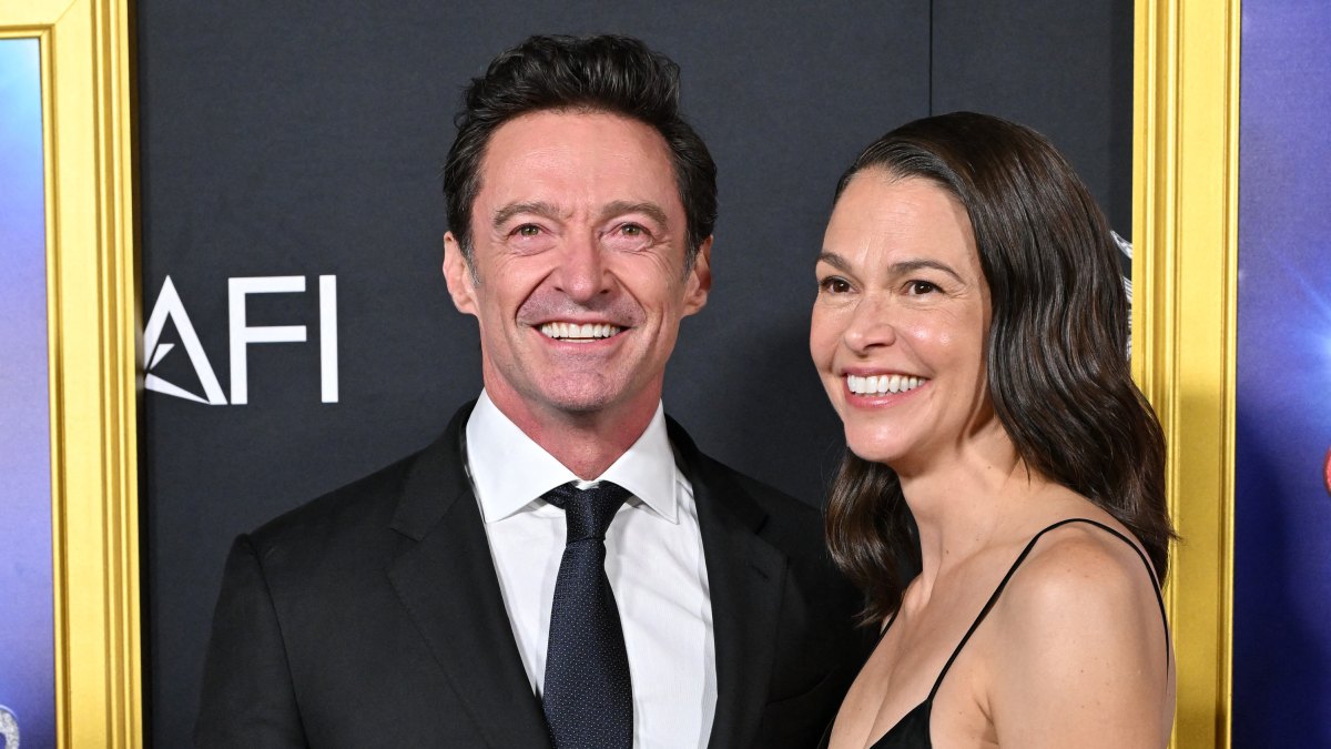 2243222038 Australian actor Hugh Jackman (L) and US actress Sutton Foster attend the world premiere of Focus Features' "Song Sung Blue" during the AFI Fest at the TCL Chinese Theatre in Hollywood, California on October 26, 2025. (Photo by LISA O'CONNOR / AFP) (Photo by LISA O'CONNOR/AFP via Getty Images)