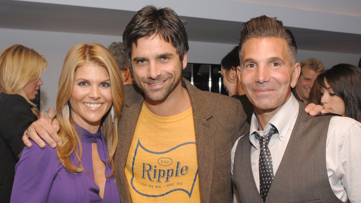 117794914 John Stamos, Lori Loughlin and Mossimo Giannulli during Target Hosts LA Fashion Week Party for Designer Mossimo Giannulli - Inside at Area in West Hollywood, California, United States. (Photo by L. Cohen/WireImage for LaForce and Stevens)