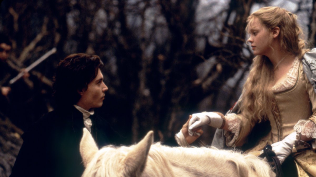 607434110 American actors Johnny Depp and Christina Ricci on the set of Sleepy Hollow, based on the story by Washington Irving and directed by Tim Burton. (Photo by Paramount Pictures/Corbis via Getty Images)