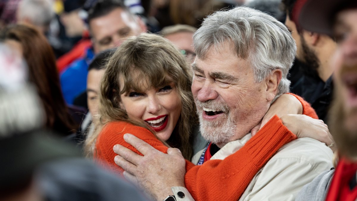 1971905221 BALTIMORE, MARYLAND - JANUARY 28: Taylor Swift hugs Ed Kielce after the AFC Championship NFL football game between the Kansas City Chiefs and Baltimore Ravens at M&T Bank Stadium on January 28, 2024 in Baltimore, Maryland. (Photo by Kara Durrette/Getty Images)