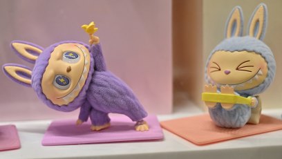This photograph shows a view of Labubu elves, collectible plush toys designed by Hong Kong illustrator Kasing Lung as part of his series "The Monsters", displayed at a Pop Mart shop in Paris on August 17, 2025. (Photo by Martin LELIEVRE / AFP) / RESTRICTED TO EDITORIAL USE - MANDATORY MENTION OF THE ARTIST UPON PUBLICATION - TO ILLUSTRATE THE EVENT AS SPECIFIED IN THE CAPTION (Photo by MARTIN LELIEVRE/AFP via Getty Images)