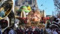 1798518715 NEW YORK, NEW YORK - NOVEMBER 23: People participate in Macy's annual Thanksgiving Day Parade on November 23, 2023 in New York City. Thousands of people lined the streets to watch the 25 balloons and hundreds of performers march in this parade happening since 1924. (Photo by Stephanie Keith/Getty Images)
