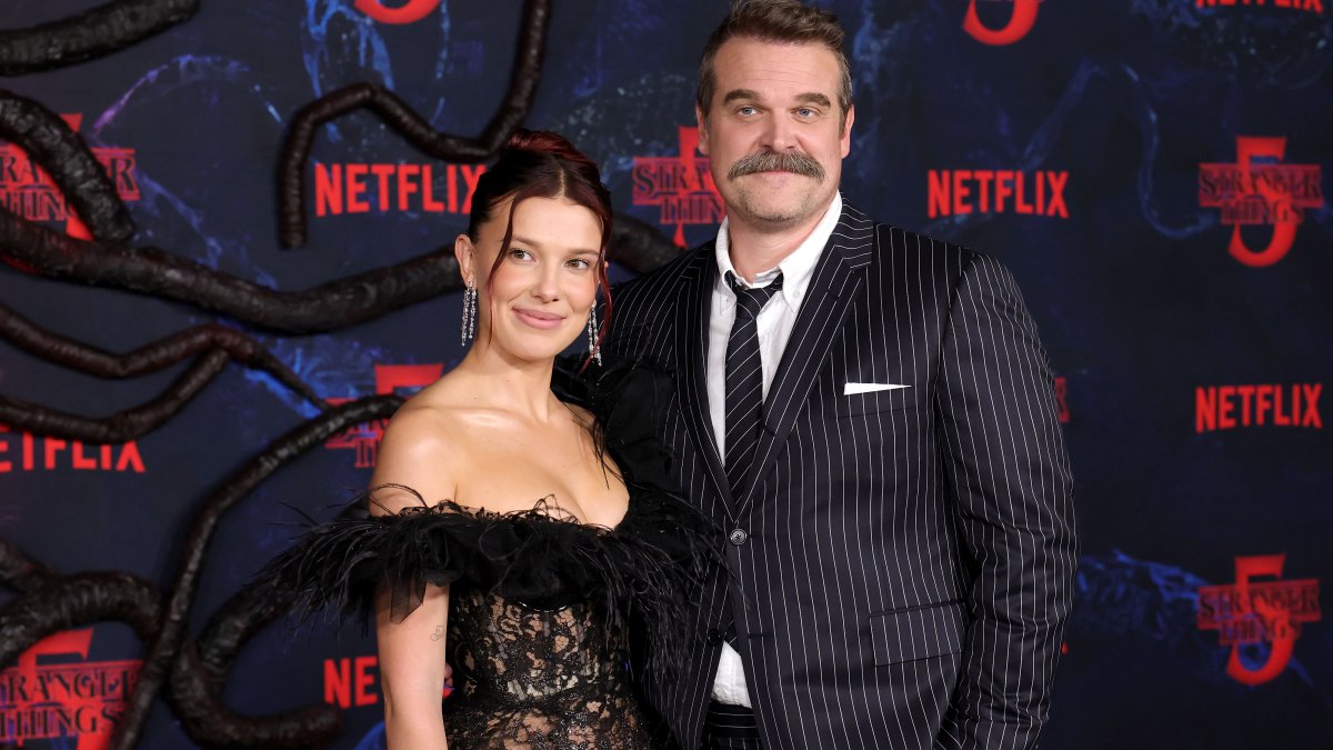 2245418840 HOLLYWOOD, CALIFORNIA - NOVEMBER 06: (L-R) Millie Bobby Brown and David Harbour attend the Los Angeles Premiere of Netflix's "Stranger Things" Season 5 at TCL Chinese 6 Theatres on November 06, 2025 in Hollywood, California. (Photo by Kevin Winter/Getty Images)