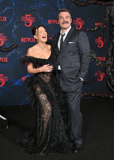 2245484749 HOLLYWOOD, CALIFORNIA - NOVEMBER 06: Millie Bobby Brown and David Harbour attend the Los Angeles Premiere of Netflix's "Stranger Things" Season 5 at TCL Chinese Theatre on November 06, 2025 in Hollywood, California. (Photo by Axelle/Bauer-Griffin/FilmMagic)