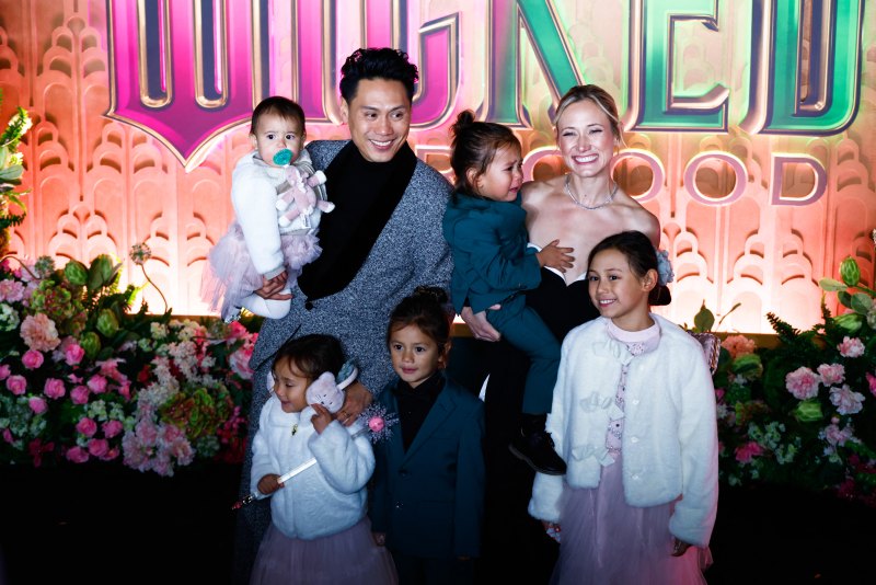 2246702518 US director Jon M. Chu with his wife graphic designer Kristin Hodge and their children attend the premiere of "Wicked: For Good" at Lincoln Center for the Performing Arts in New York on November 17, 2025. (Photo by kena betancur / AFP) (Photo by KENA BETANCUR/AFP via Getty Images)