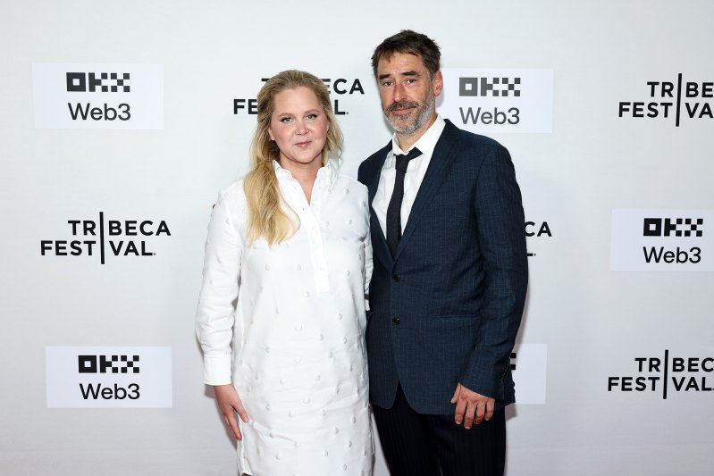 2219710165 NEW YORK, NEW YORK - JUNE 11: (L-R) Amy Schumer and Chris Fischer attend the "Room To Move" premiere during the 2025 Tribeca Festival at SVA Theater on June 11, 2025 in New York City. (Photo by Jamie McCarthy/Getty Images for Tribeca Festival)