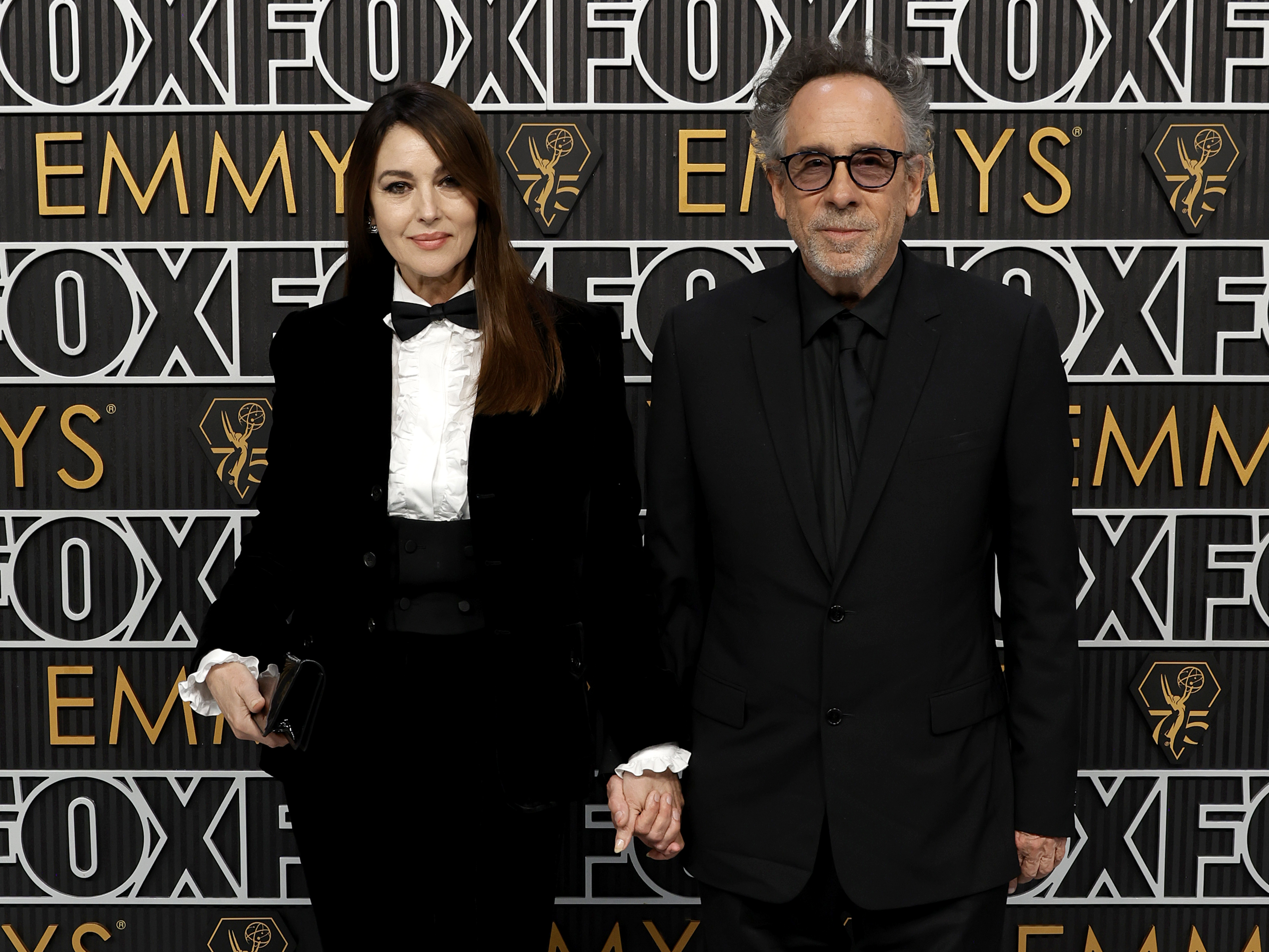 LOS ANGELES, CALIFORNIA - JANUARY 15: (L-R) Monica Bellucci and Tim Burton attend the 75th Primetime Emmy Awards at Peacock Theater on January 15, 2024 in Los Angeles, California. (Photo by Frazer Harrison/Getty Images)