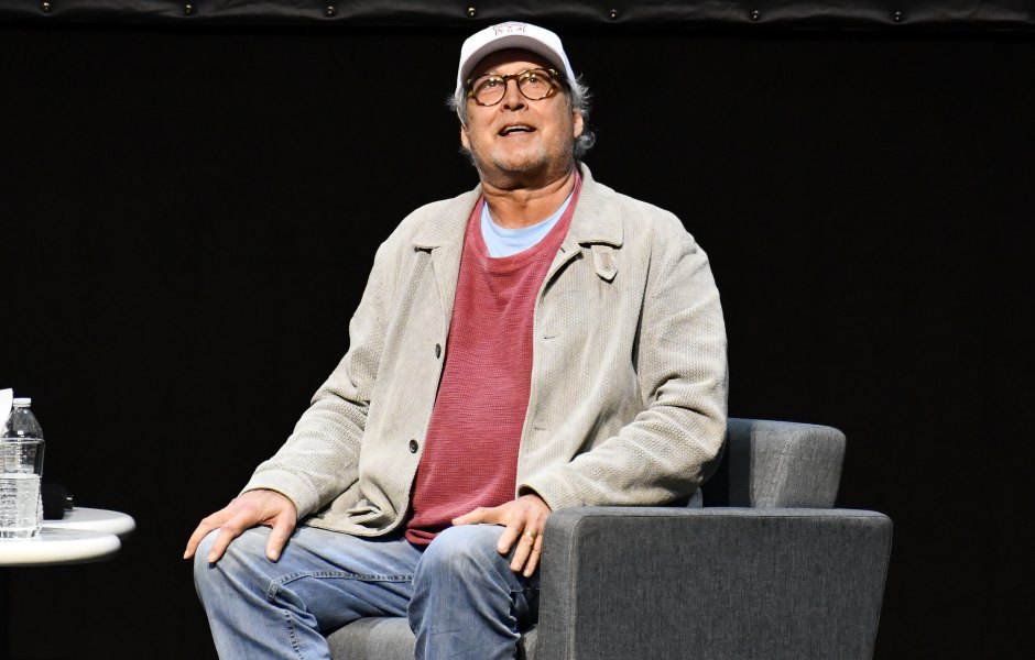 1192233828 LOS ANGELES, CALIFORNIA - DECEMBER 05: Chevy Chase speaks during a Q&A session following a special screening of "National Lampoon's Christmas Vacation" at Microsoft Theater on December 05, 2019 in Los Angeles, California. (Photo by Allen Berezovsky/Getty Images)