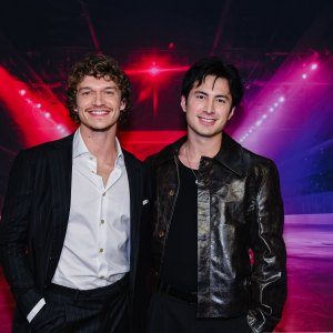 2248297214 'Heated Rivalry' Stars Hudson Williams and Connor Storrie Carry the Olympic Flame in Italy