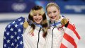 -2260590898 MILAN, ITALY - FEBRUARY 08: Gold medalist Alyssa Liu and Amber Glenn of Team United States pose for a photo after the Medal Ceremony for the Team Event after the Men's Single Skating - Free Skating Team Event on day two of the Milano Cortina 2026 Winter Olympic games at Milano Ice Skating Arena on February 08, 2026 in Milan, Italy. (Photo by Jamie Squire/Getty Images)