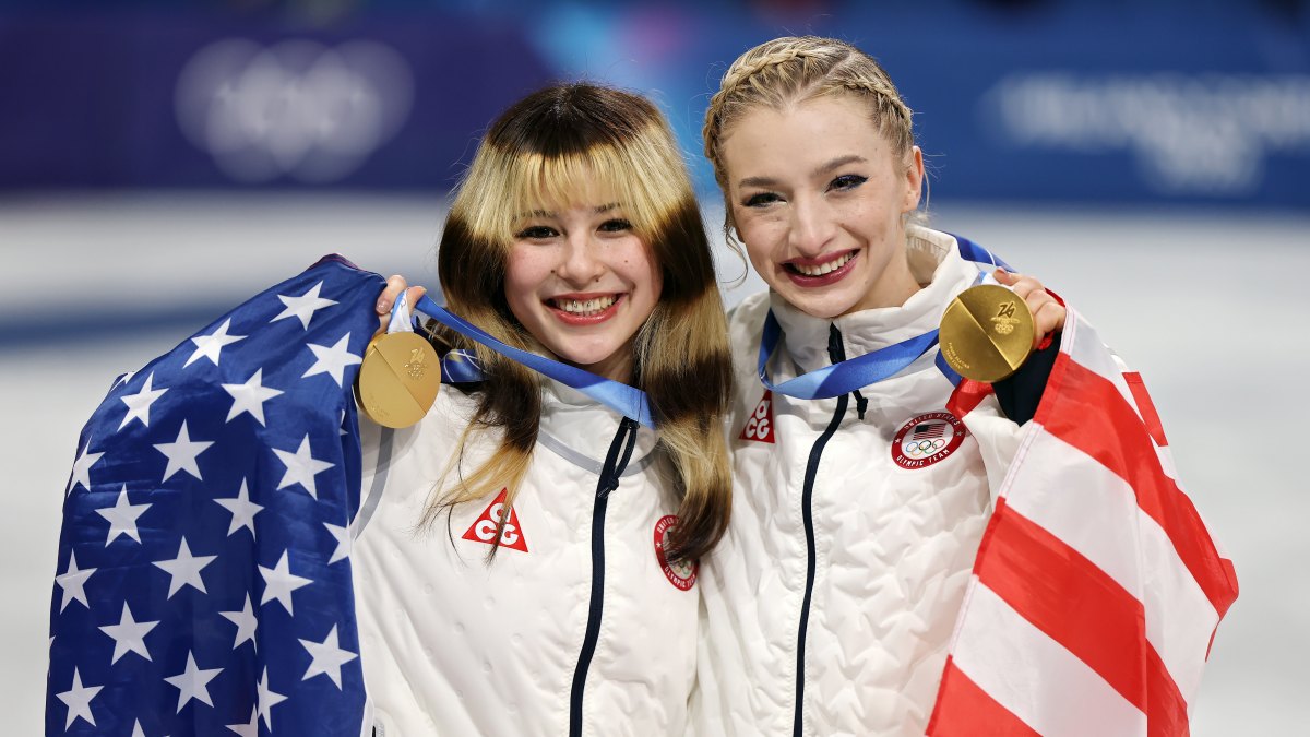 -2260590898 MILAN, ITALY - FEBRUARY 08: Gold medalist Alyssa Liu and Amber Glenn of Team United States pose for a photo after the Medal Ceremony for the Team Event after the Men's Single Skating - Free Skating Team Event on day two of the Milano Cortina 2026 Winter Olympic games at Milano Ice Skating Arena on February 08, 2026 in Milan, Italy. (Photo by Jamie Squire/Getty Images)