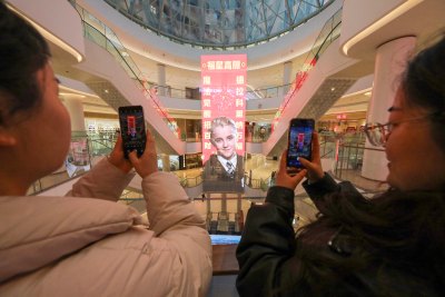 2259434378People take photos of a giant Lunar New Year poster featuring English actor Tom Felton posing as Draco Malfoy, a character from the Harry Potter movies series, at a shopping mall in Shangqiu, in China's central Henan province on February 5, 2026. The character has become popular in China in the buildup to the Year of the Horse because the transliteration of his surname contains the Chinese characters for "horse" and "good fortune", making him an auspicious omen for the year ahead. (Photo by AFP via Getty Images) / China OUT
