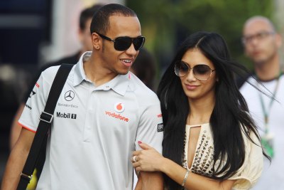 ISTANBUL, TURKEY - MAY 29: Lewis Hamilton of Great Britain and McLaren Mercedes and his girlfriend Nicole Scherzinger of the Pussycat Dolls walk in the paddock following qualifying for the Turkish Formula One Grand Prix at Istanbul Park on May 29, 2010, in Istanbul, Turkey. (Photo by Mark Thompson/Getty Images)