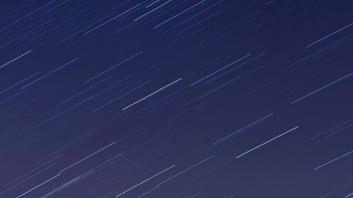 LONDON, ENGLAND - APRIL 21: (EDITORS NOTE: Multiple exposures were combined in camera to produce this image.) A meteor crosses the sky illuminated under the stars on a clear night on April 21, 2020 in London, England. The clear skies created by the New Moon coincide with the Lyrid meteor shower, an annual display caused by the Earth passing through a cloud of debris from a comet called C/186 Thatcher. (Photo by Simon Robling/Getty Images)