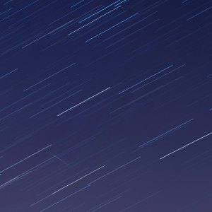 LONDON, ENGLAND - APRIL 21: (EDITORS NOTE: Multiple exposures were combined in camera to produce this image.) A meteor crosses the sky illuminated under the stars on a clear night on April 21, 2020 in London, England. The clear skies created by the New Moon coincide with the Lyrid meteor shower, an annual display caused by the Earth passing through a cloud of debris from a comet called C/186 Thatcher. (Photo by Simon Robling/Getty Images)