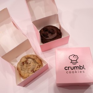 NEW YORK, NEW YORK - OCTOBER 13: A view of Crumbl Cookies during Food Network New York City Wine & Food Festival presented by Capital One - Blue Moon Burger Bash presented by Pat LaFrieda Meats hosted by Rachael Ray at Pier 86 on October 13, 2023 in New York City. (Photo by Monica Schipper/Getty Images for NYCWFF)