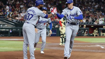 PHOENIX, ARIZONA - AUGUST 30: Freddie Freeman #5 of the Los Angeles Dodgers high fives Teoscar Hernández #37 and Shohei Ohtani #17 after hitting a two-run home run against the Arizona Diamondbacks during the first inning of the MLB game at Chase Field on August 30, 2024 in Phoenix, Arizona. (Photo by Christian Petersen/Getty Images)