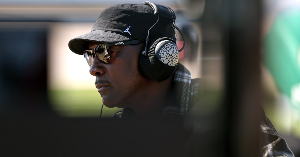 Denny Hamlin Reacts to Michael Jordan’s Viral Choke-Kiss Moment After NASCAR Race