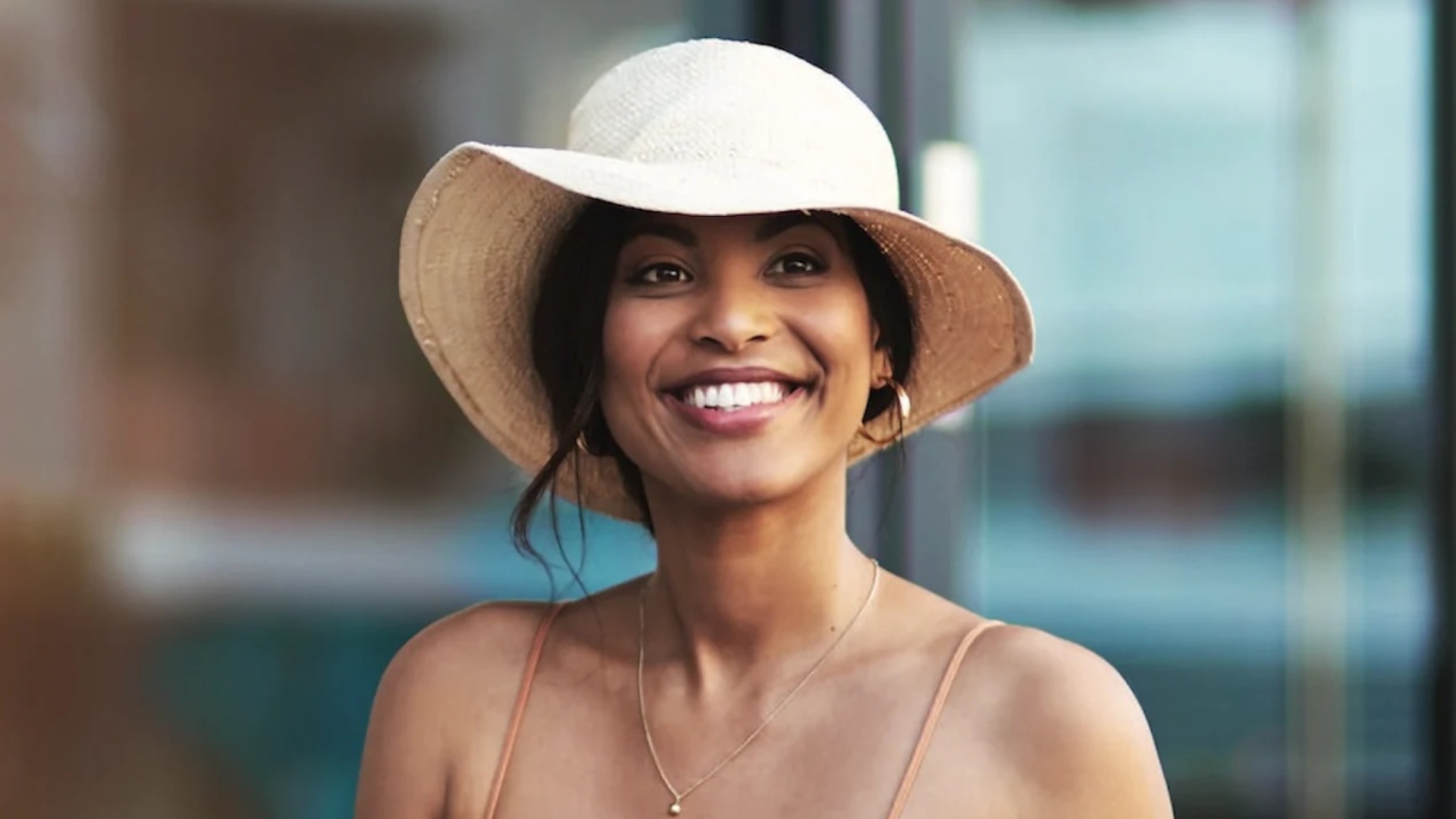 A close-up image of a woman following a post-wax skincare routine, applying a lightweight soothing product to freshly waxed skin.