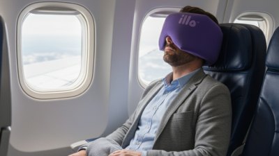 Person wearing the illo sleep companion while resting.